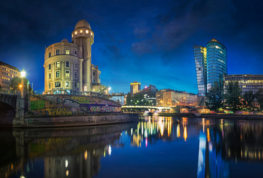 The Danube Canal in Vienna at Night with Urania and Uniqa Tower, Vienna, Austria