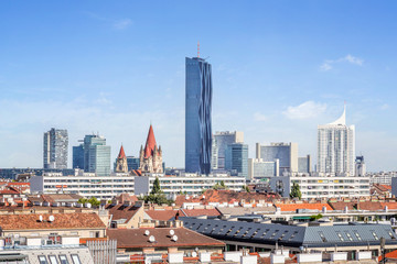 Fototapeta premium View over Skyline of Vienna with DC Tower and the St. Francis of Assisi Church, Vienna, Austria