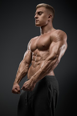 Strong and power bodybuilder posing