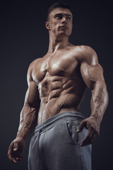 Fototapeta na wymiar Close-up of athletic muscular man