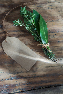 bouquet garni of thyme and bay leaf, a blank label next