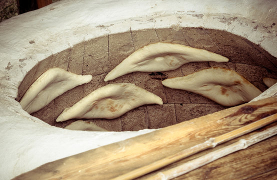 Traditional Georgian bread in a tandoor.