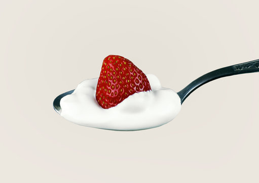 fresh strawberries and cream on a silver spoon