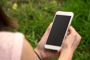woman with a phone in his hand