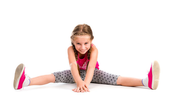 little girl doing yoga