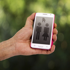 mobile with silhouette of couples