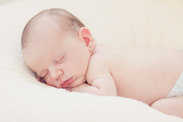 Sleeping newborn baby boy