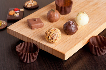 Chocolate handmade candies on a kitchen table