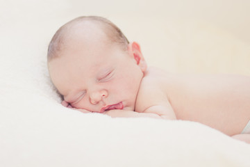 Sleeping newborn baby boy