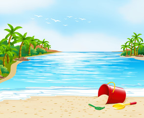Ocean view with bucket on the sand © GraphicsRF