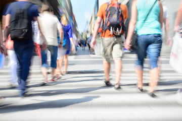 Diversified young crowd on street