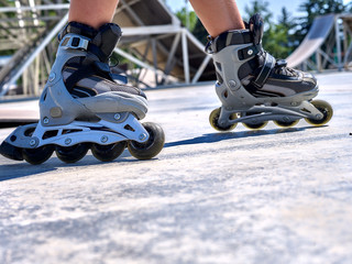 Girl riding on roller skates .