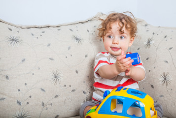 Fototapeta premium Baby boy playing