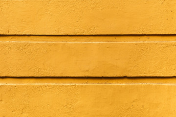 Background with fragment of yellow brick wall