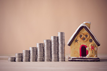 house model and stack of coin