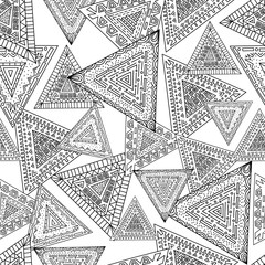 Triangle ethnic seamless pattern. Tribal ornaments hand-drawn background.