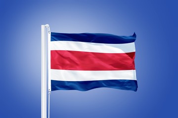 Flag of Costa Rica flying against a blue sky