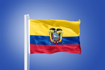 Flag of Ecuador flying against a blue sky