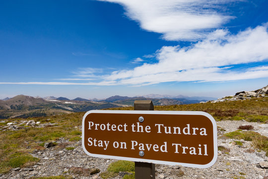 Protect the Tundra, Stay on Pave Trail Sign