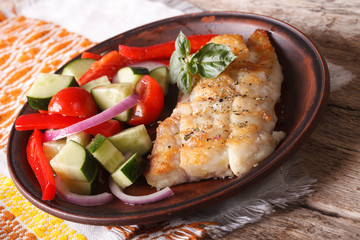 grilling fish fillets and fresh vegetable close-up. Horizontal
