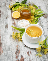 cup of herbal tea with linden flowers