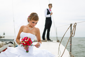 Bride and groom on a yacht