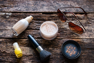 female cosmetics on a wooden background