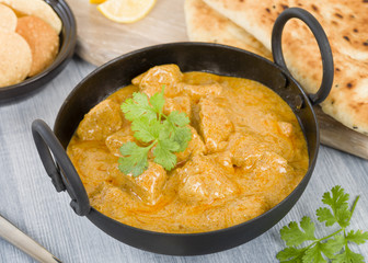 Chicken Korma - Chicken on a mildly spiced creamy sauce. Indian cuisine.
