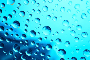 Water drops on blue background
