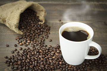 Coffee cup and coffee beans.
