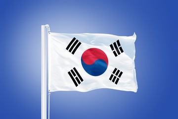 Flag of South Korea flying against a blue sky