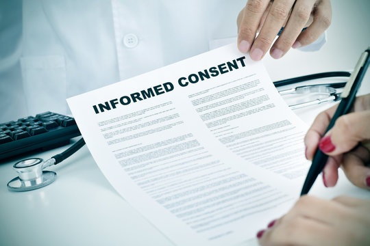young woman signing an informed consent