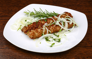 Kebab with onion rings