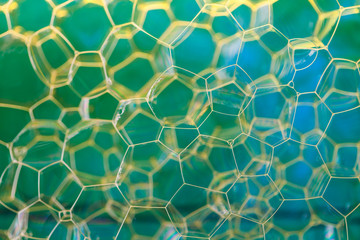 Soap suds extreme closeup creating multi layered pattern