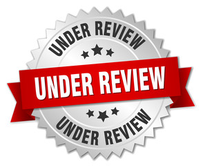 under review 3d silver badge with red ribbon