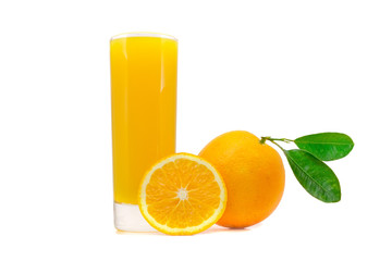 glass of fresh orange juice with whole oranges with leaves and sliced orange isolated on white background