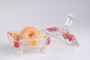 Fototapeta na wymiar crystal bowl with food on a background.