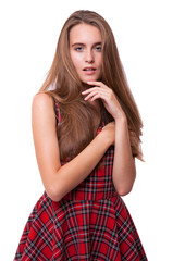 Young woman in checkered dress