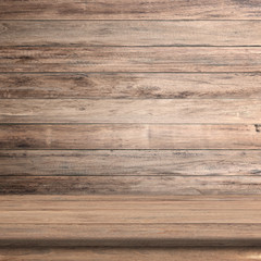 Vintage wood table in wood wall room.