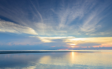 Fototapeta na wymiar Panoramic dramatic tropical sea sky sunset background