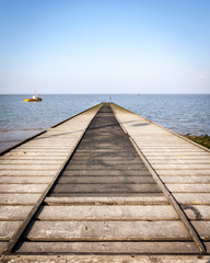Obraz premium Boat slipway. A symmetrical perspective view of a boat slipway in the seaside town of Morecambe, Lancashire, UK.