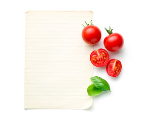 Naklejka na ściany i meble chopped tomatoes and basil leaf with blank paper