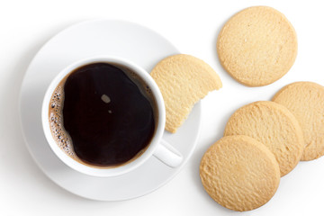White cup of black coffee and saucer with shortbread biscuits fr