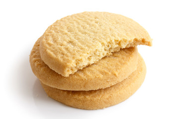 Three round shortbread biscuits isolated on white. Half biscuit.