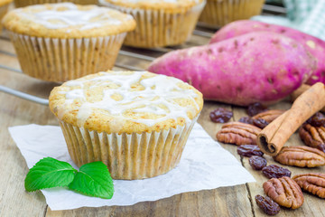 Citrus-glazed sweet potato muffins with pecan nuts and raisins