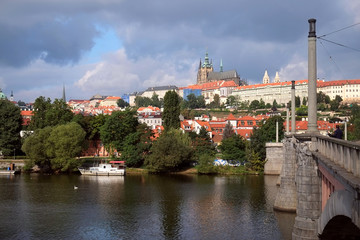 Fototapeta na wymiar Prague Castle view from the river Vltava, autumn sky