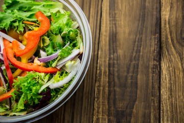 Healthy bowl of salad on table