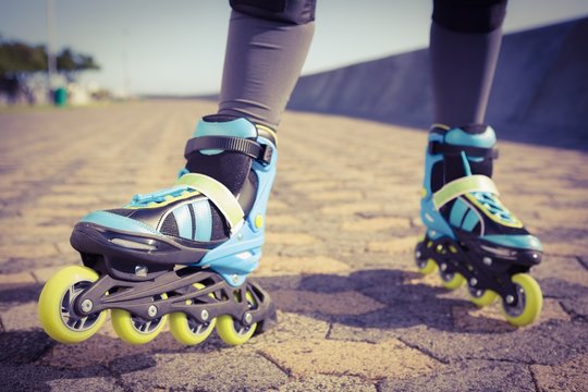 Close up view of woman wearing inline skates