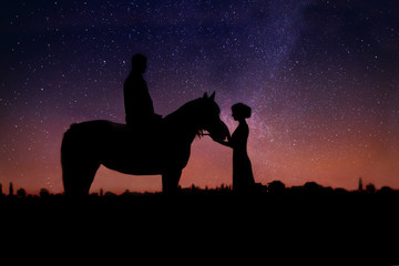 Couple in love against starry sky