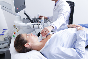 Doctor doing a doppler sonography